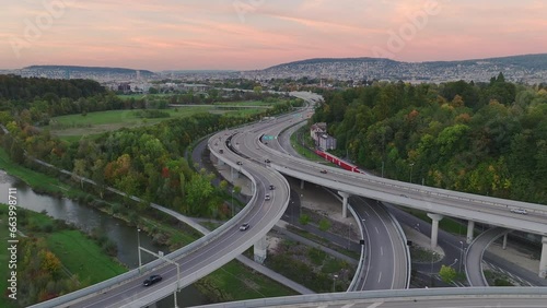 sunset time zurich city district traffic street road interchange aerial panorama 4k switzerland