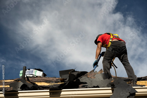 Reroofing house after hail storm; Laramie, Wyoming 