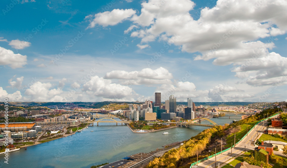 Fototapeta premium Panoramic aerial view of downtown Pittsburgh, Pennsylvania at the intersection of three rivers, the Allegheny, the Monongahela, and the Ohio, taken from atop Mount Washington