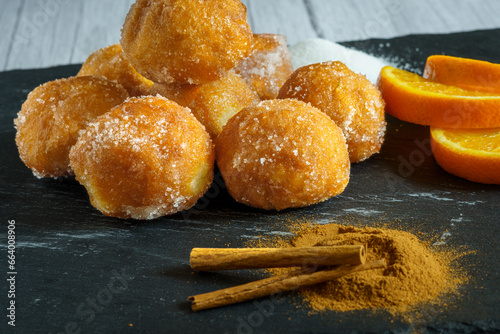 Buñuelos de viento, are balls of dough made with wheat flour, butter and eggs that are fried in hot oil. They are served in the celebrations of All Saints' Day. photo