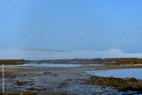 Fog Hovering Over the Shore in Casco Bay