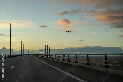 Øresund bridge at sunset with gale storm blowing photo