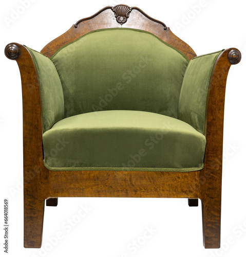 Classic armchair art deco style in green velvet with wooden legs isolated on white background. Front view