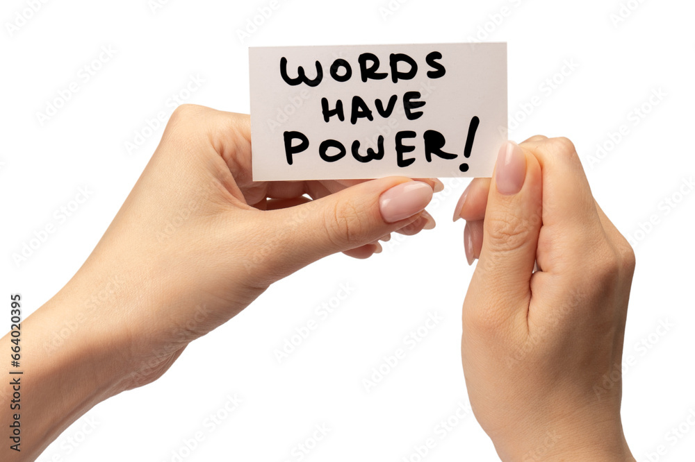 Words have power text on a card in a woman hand isolated. Words have power text on a card in a woman hand isolated.