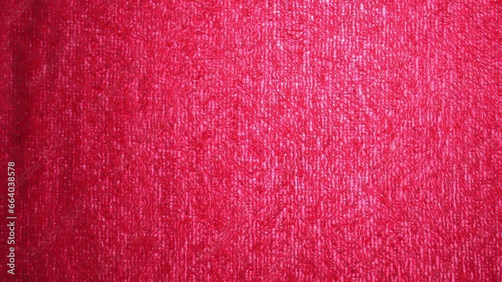 Close up of pink woven texture made of wool as background