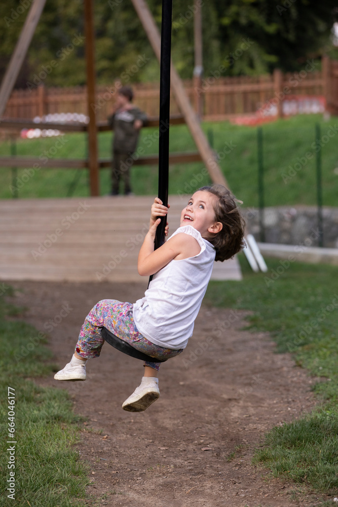 Cute kids playing in the park Cute kids playing in the park