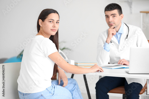Young woman with bad postur...