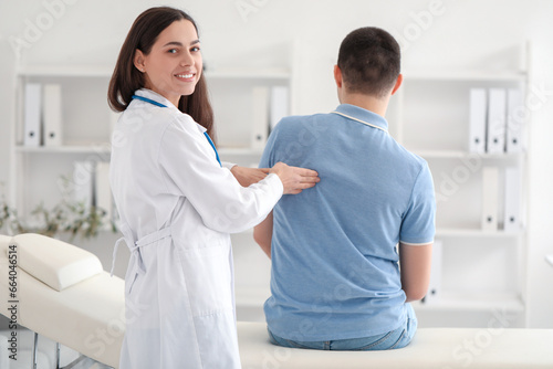 Female doctor checking post...