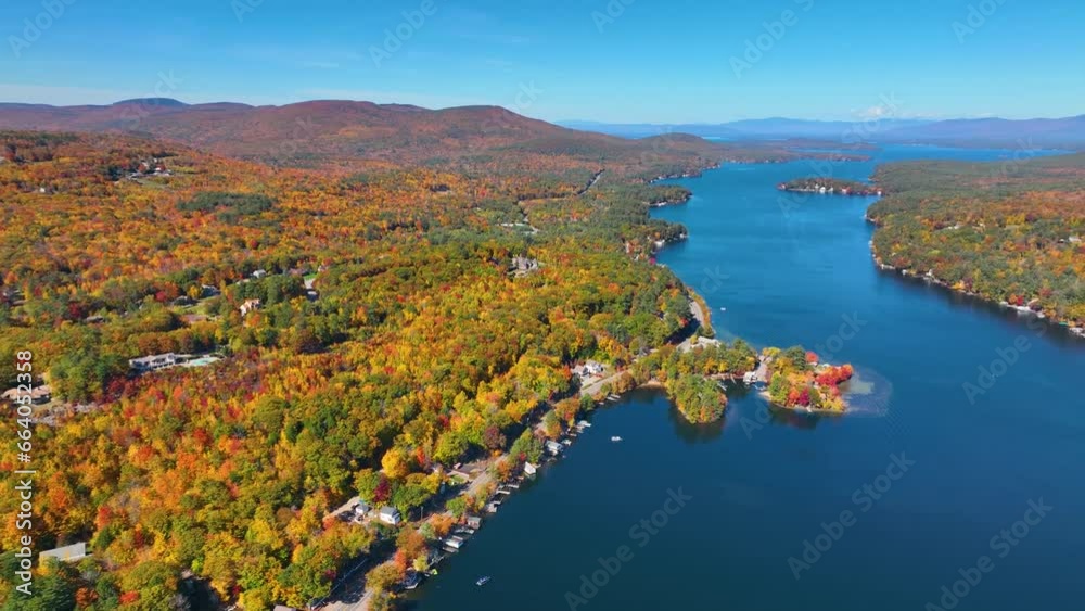 Alton Bay at Lake Winnipesaukee aerial view and village of Alton Bay in fall in town of Alton, New Hampshire NH, USA. Alton Bay at Lake Winnipesaukee aerial view and village of Alton Bay in fall in town of Alton, New Hampshire NH, USA.