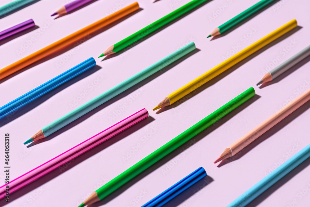 Composition with different pencils on color background Composition with different pencils on color background