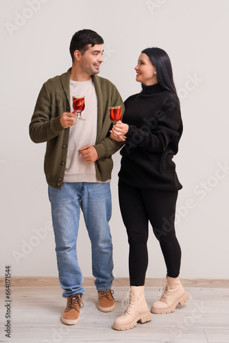 Young couple with glasses o...