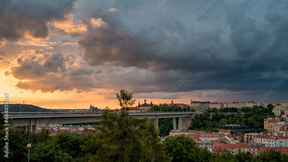 Sunset in Prague with bridge and Prague castle
