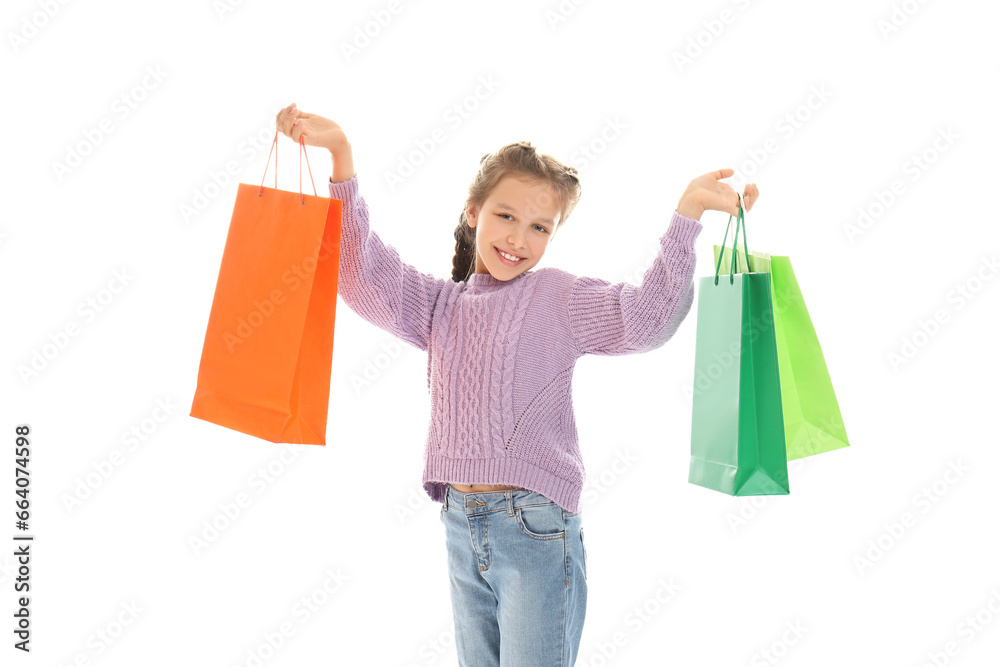 Little girl with shopping bags isolated on white background Little girl with shopping bags isolated on white background