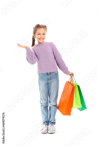 Little girl with shopping b...