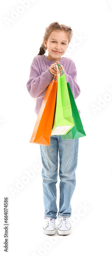 Little girl with shopping b...