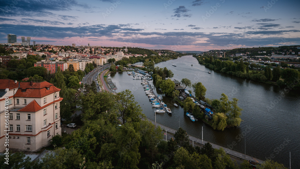 A view of the Vltava River from Prague's Vyšehrad. There is a bay with a harbour on the river. 