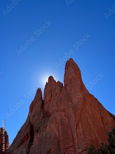 Majestic Red Rocks and Daytime Moon: A Colorado Dream