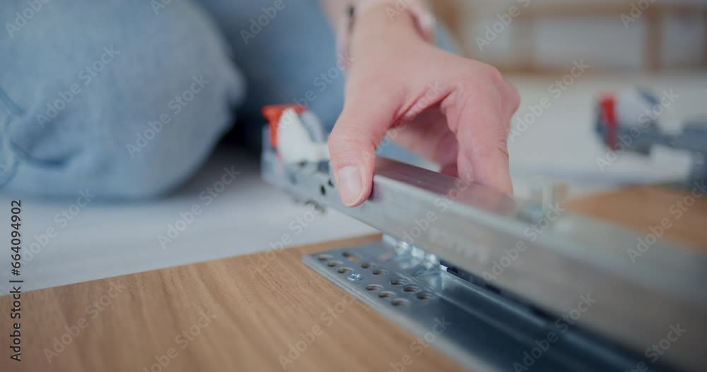Repairwoman fixing screw while making furniture Repairwoman fixing screw while making furniture