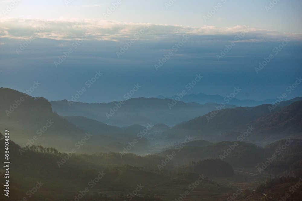 Wuyishan, Wuyishan City, Fujian Province - Aerial view of cityscape and mountains