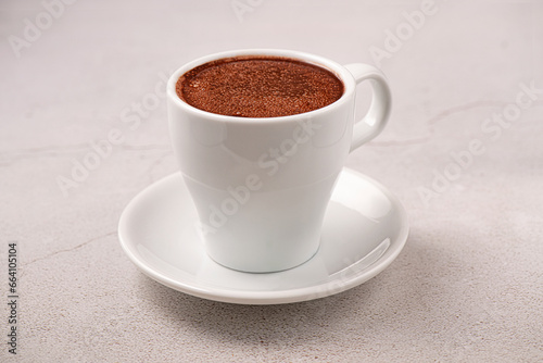 Hot chocolate cup. Studio shoot isolated on gray background. Brazilian chocolate.