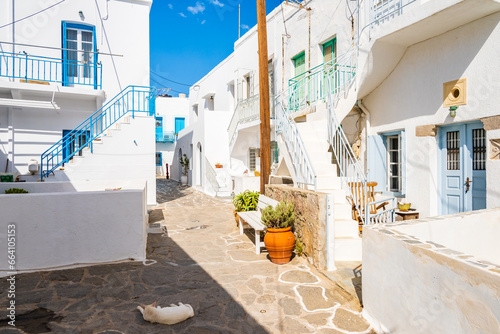 Typical narrow street with Greek architecture in Plaka village, Milos island, Cyclades, Greece