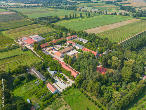 Albigowa, Subcarpathian, Poland - 20 August 2023: aerial view of the former Potocki manor and present orchard farm photo