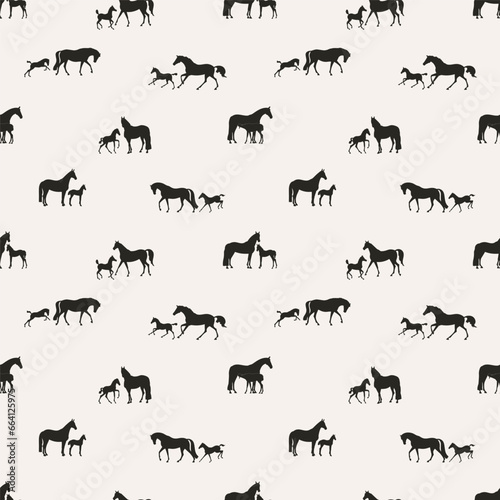 Horses with their foals on a walk, seamless vector pattern © irinamaksimova