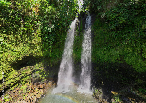 The twin lower falls at Togonan Falls  a popular adventure tourist spot in the Philippines. 