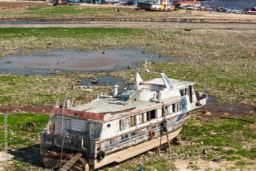 AMAZONAS, DRY - Houseboats are stranded on the edge of the region known as Manaus Moderna, the city's port region, during the drought on the Rio Negro. The Amazon region suffers from a severe drought  photo
