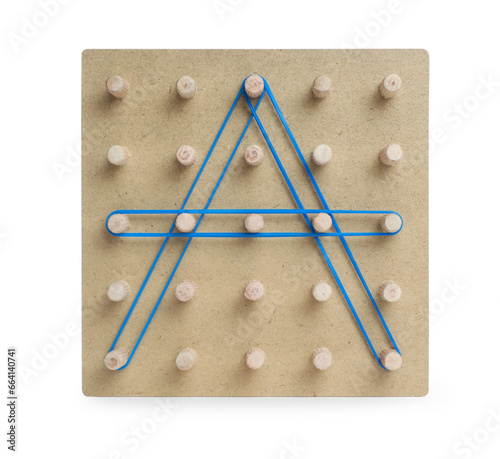 Wooden geoboard with letter A made of rubber bands isolated on white. Educational toy for motor skills development photo