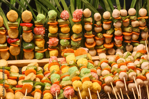 a variety of meatballs beautifully displayed for sale in Vietnamese kios photo