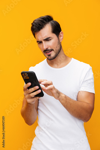 Mobile man yellow phone smartphone portrait phone space happy smiling cyberspace communication copy © SHOTPRIME STUDIO