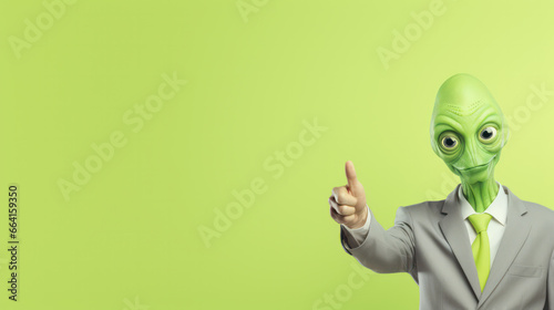 Image of an alien business man. Humanoid from an other planet portrait on studio background.