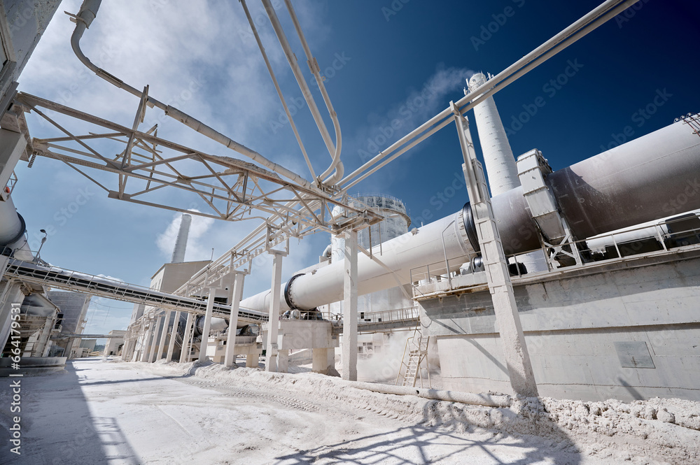 Fototapeta premium Tubular rotary furnace and equipment on territory of plant