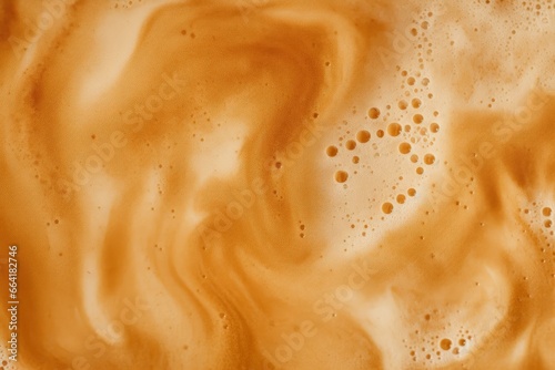 Coffee foam texture. © Anny