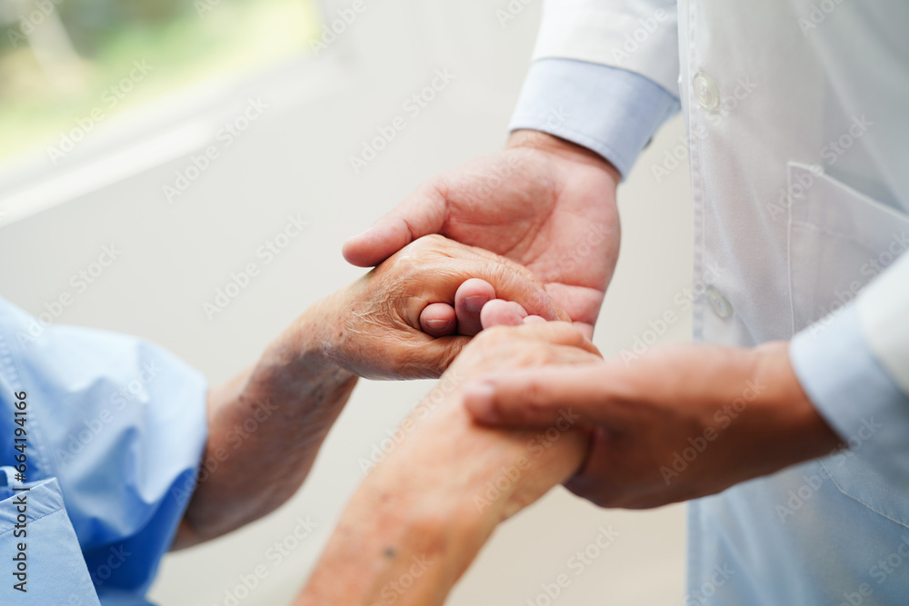 Doctor holding hands Asian elderly woman patient, help and care in hospital. - obrazy, fototapety, plakaty 