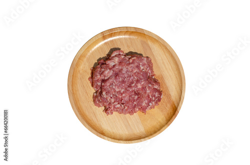 Raw fresh minced pork on a wooden plate on transparent background, Top view