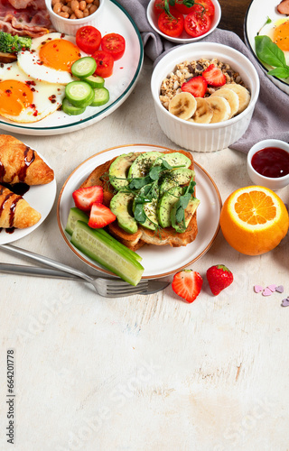 Healthy breakfast eating concept  various morning food on light background