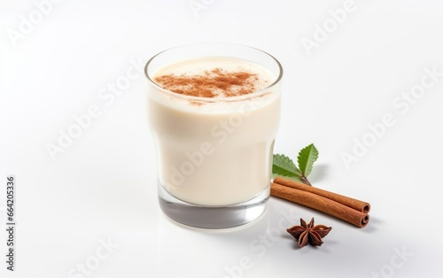 Old fashioned glass of homemade eggnog with spices isolated on a white background. AI Generative