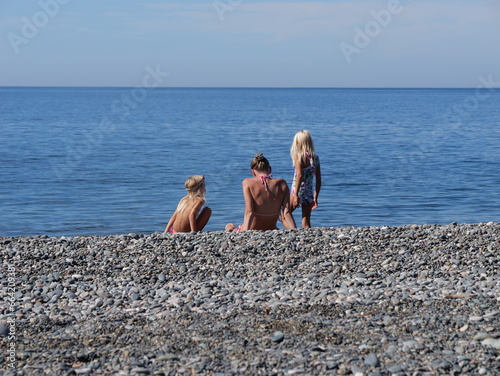 parent and child on beach