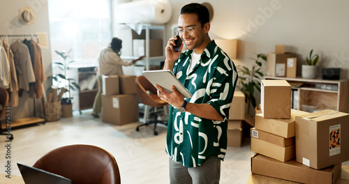 Business, phone call and man with a tablet, boxes or connection with online order, internet or website info. Person, employee or entrepreneur with technology, cellphone or online order with ecommerce