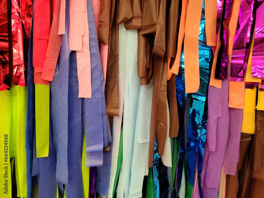 Strips of colorful craft papers in closeup