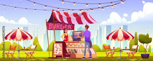 Street burger cafe in city park with young male buyer and female vendor. Cartoon landscape with hamburger stand, tables with chairs and umbrellas under light bulb garlands - fast food outdoor market.