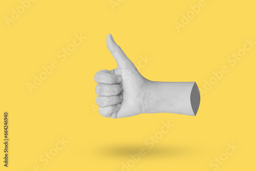 Woman hand gesture thumb up sign isolated on yellow background
