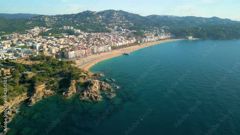 Full panoramic view with Drone of Lloret De Mar beach on the Costa Brava of Gerona Spain, European tourism Full panoramic view with Drone of Lloret De Mar beach on the Costa Brava of Gerona Spain, European tourism