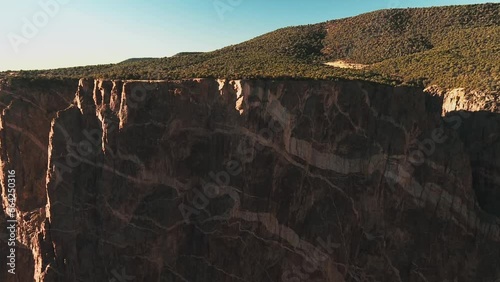 Closeup Of Painted Walls Of Black Canyon Of The Gunnison National Park In Western Colorado, USA. aerial ascend photo