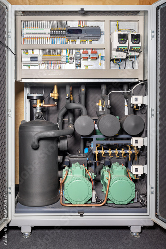 Refrigeration equipment of a compressor-condenser station with an electronic controller unit.