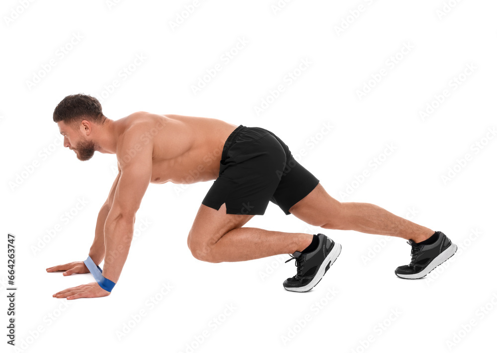 Young man exercising with elastic resistance band on white background Young man exercising with elastic resistance band on white background