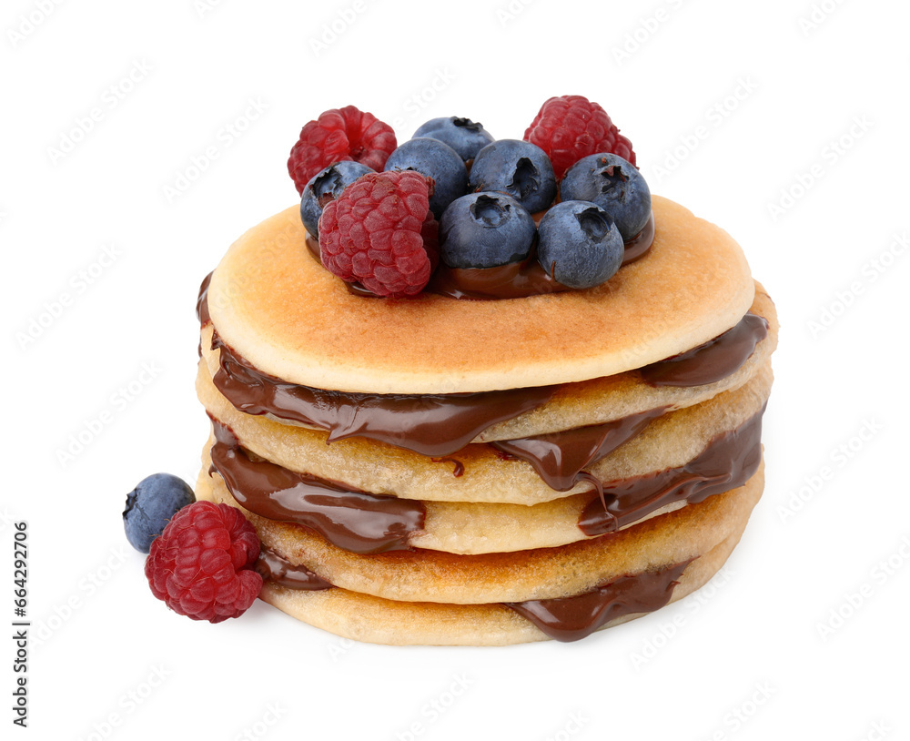 Stack of tasty pancakes with chocolate spread and berries isolated on white Stack of tasty pancakes with chocolate spread and berries isolated on white