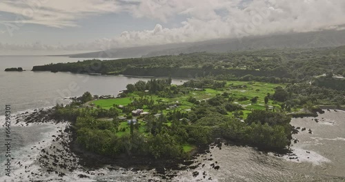 Maui Hawaii Aerial v39 cinematic drone flyover Ke‘Anae peninsula capturing lowland farm fields with taro plantations and coastal hillside mountain landscape - Shot with Mavic 3 Cine - December 2022 photo